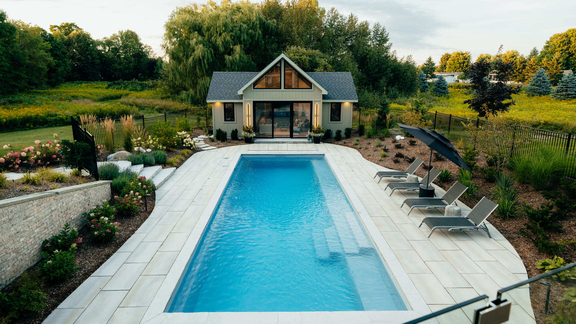 Inground fiberglass pool installed by Hipel Pools in Waterloo, Ontario