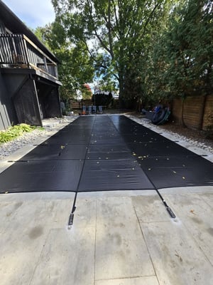 A Winter Safety Pool Cover Installed By Hipel Pools