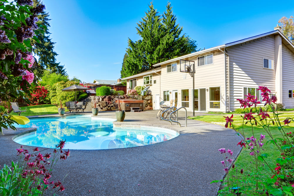 Backyard fiberglass swimming pool in Woolwich Township Ontario